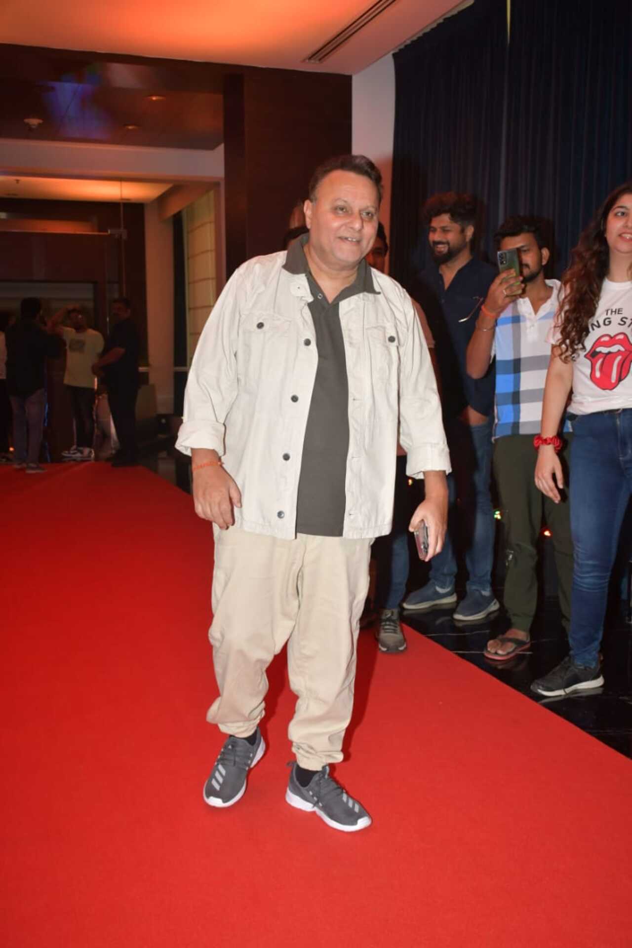 Director Anil Sharma posed for the paparazzi at the press conference